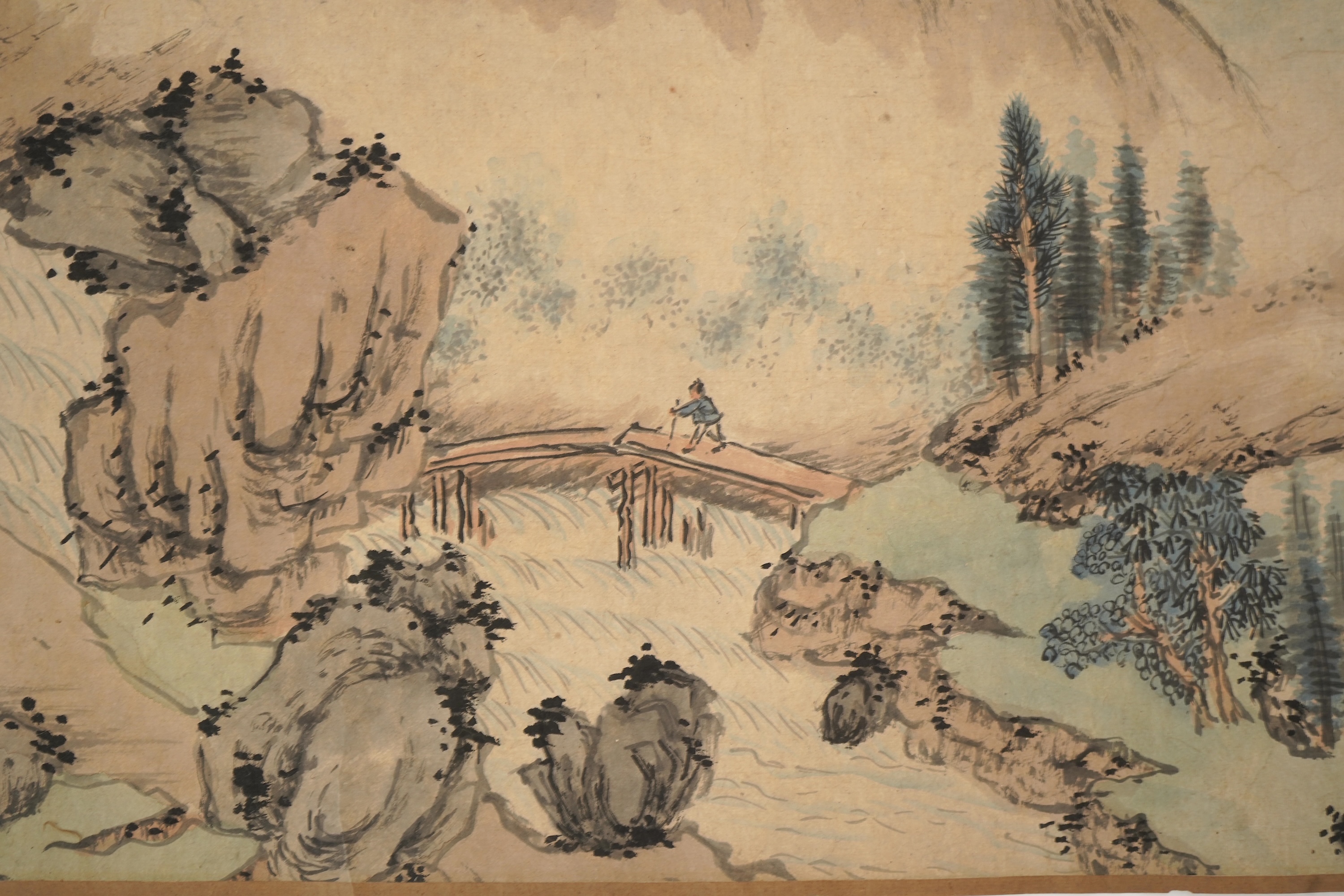 Chinese School , (Qing dynasty), Figures in a mountainous river landscape, Ink and colour on paper handscroll, 268.5cm x 29cm excluding borders